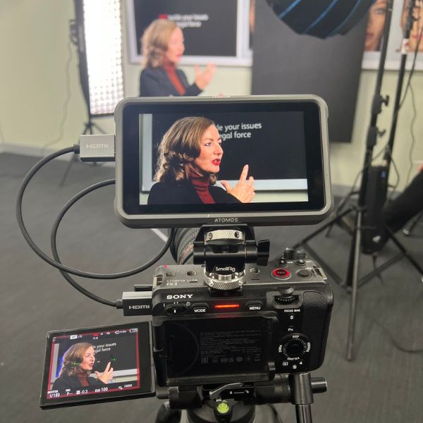 Behind the scenes photo of Melissa WEstjustice being interviewed on camera.