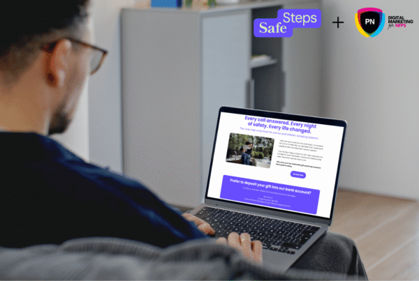 man looking at safe steps landing page on laptop